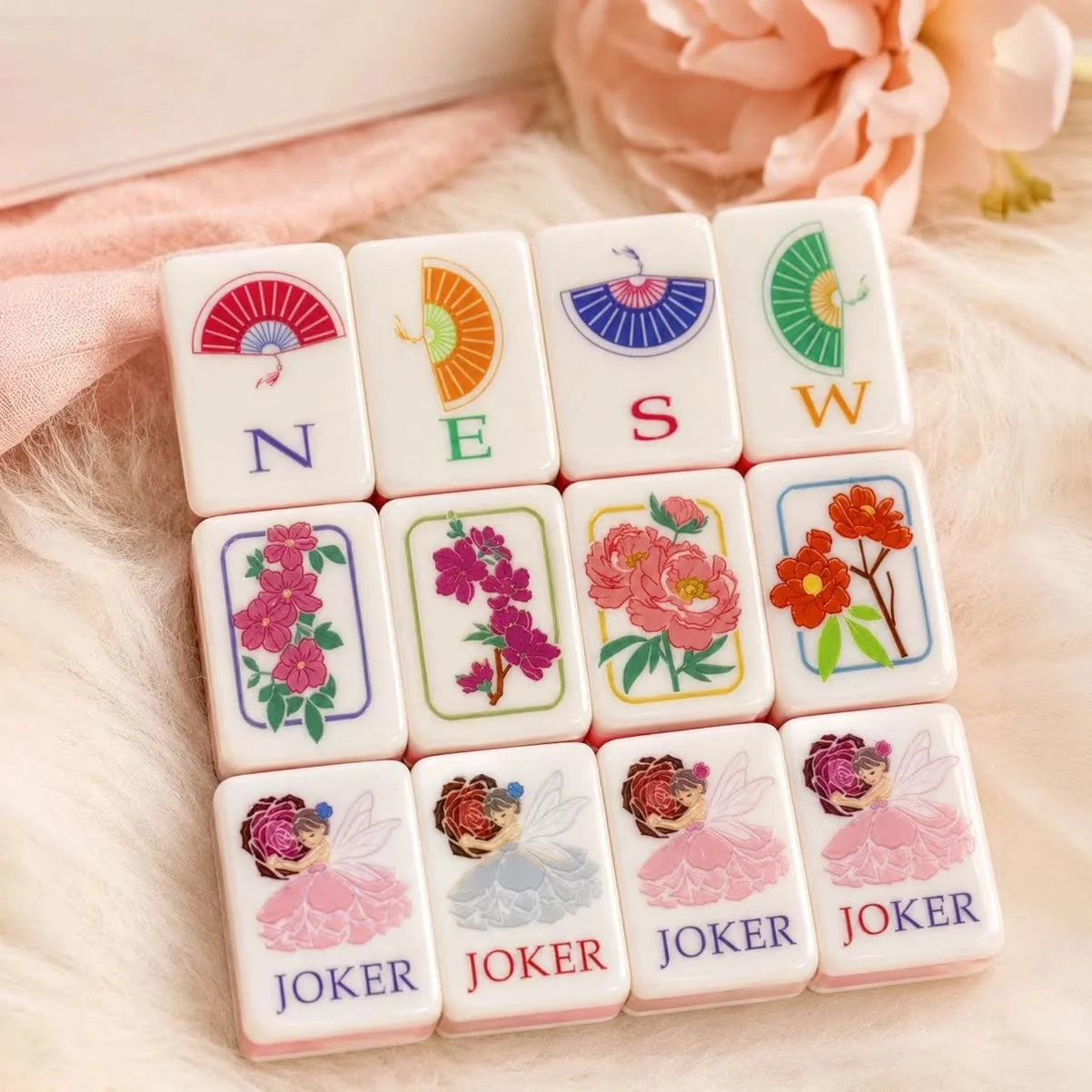 Pink floral Mahjong set at a game night
